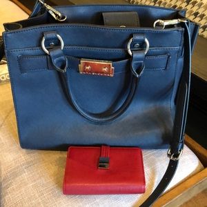 Navy blue satchel purse.